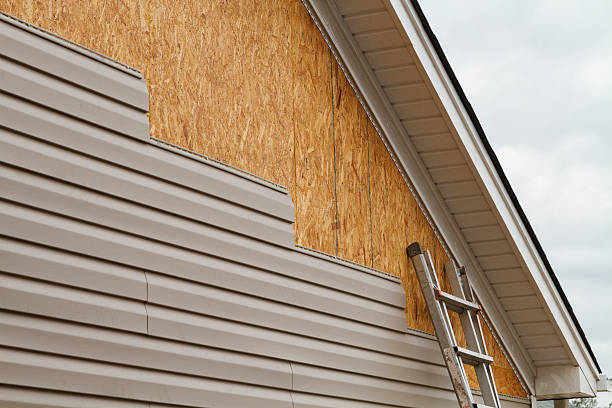 Professional Siding Repair technician working in Mattaponi, VA